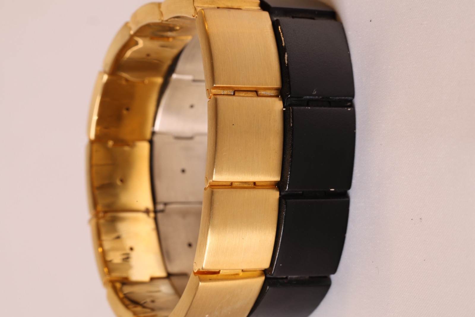 Vitul Sol and Onyx edition bracelets stacked on a white background
