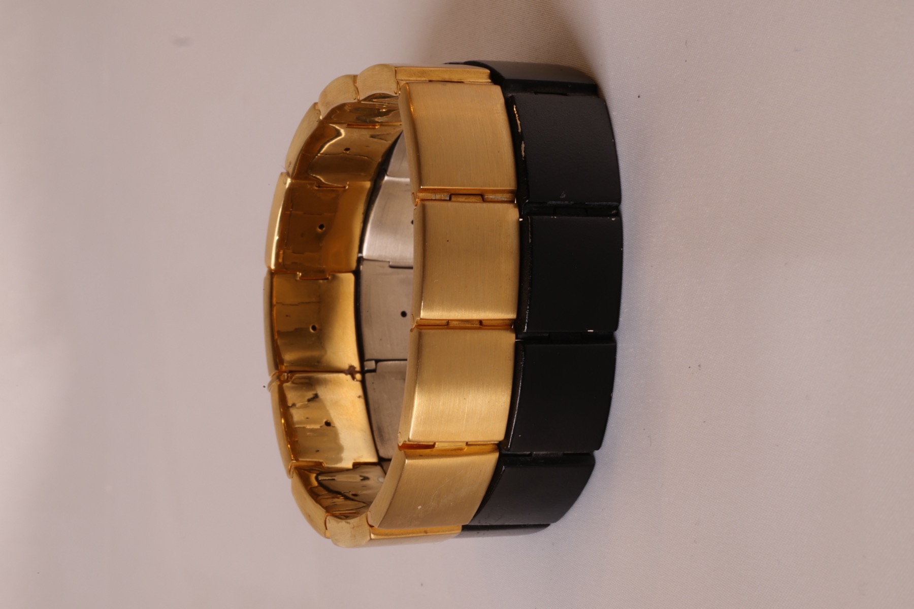 Vitul Sol and Onyx edition bracelets stacked side by side